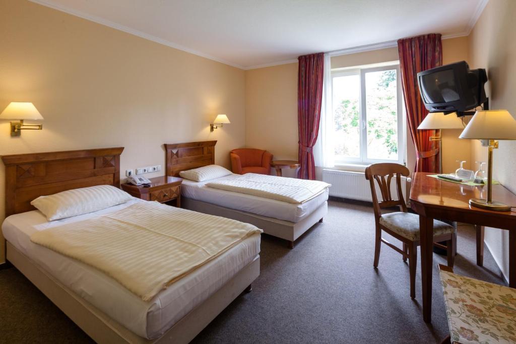 Hotel Garni Schlossgarten Neustrelitz Szoba fotó